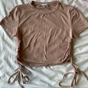 Cute tan shirt ties on the side